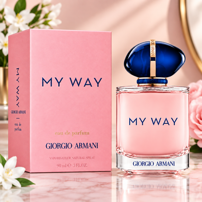 A Giorgio Armani My Way perfume set featuring a pink box and a clear perfume bottle filled with pink liquid, topped with a dark blue cap and silver accents.
